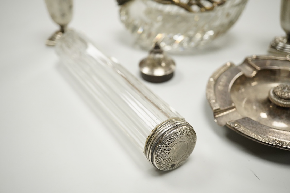An Elizabeth II silver mounted vase with wavy border, Adie Brothers, Birmingham, 1955, weighted, 20.4cm, a silver mounted glass swan bonbon dish, a George V silver three piece condiment set, a silver mounted glass toilet
